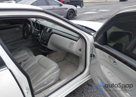 2009 Cadillac Dts 1Sb z USA, uszkodzony, nr VIN 1G6KD57Y19U136202